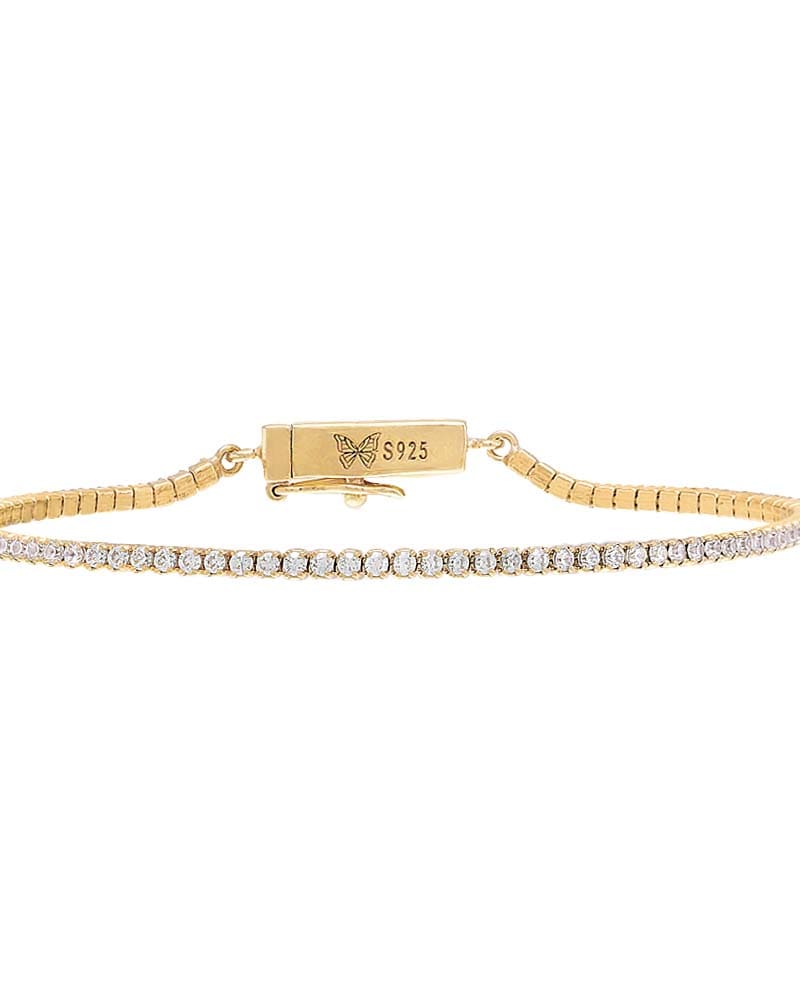 Front of a size One Size Classic Thin Tennis Bracelet Gold One Size in Gold by By Adina Eden. | dia_product_style_image_id:292370
